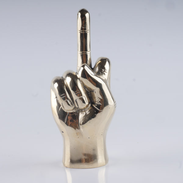 a silver colored metal object with a peace sign on it