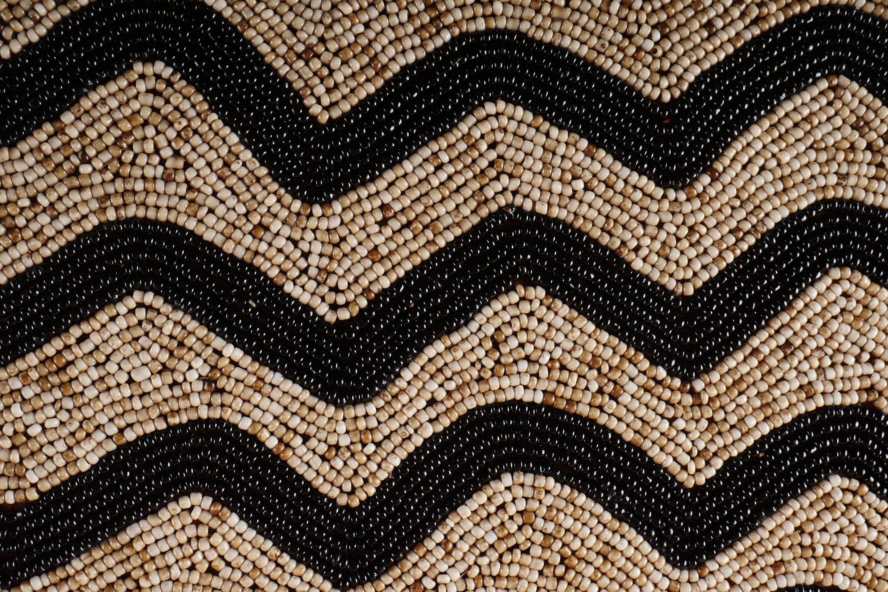 The Black Waved Beaded Shield